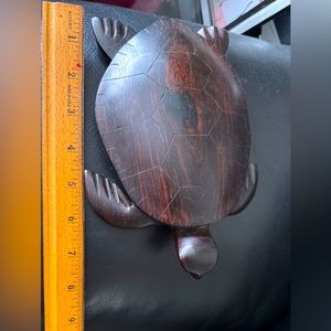 Hand-craved dark brown wooden turtle